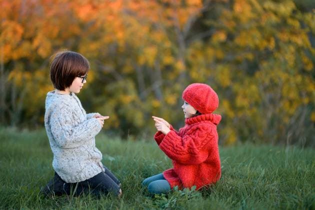MR_ID26944_20119_MayaBosquetCarli.jpg, MR_ID26944_20120_LeoBosquetCarli.jpg Siblings, enjoy a playful day outdoors in a park surrounded by autumn colors. The boy wears a cozy sweater and glasses, while the girl is dressed in a vibrant red outfit with a matching hat, highlighting the seasonal atmosphere. Model Released MagdalenaCarli_ID26944_777539_010 Copyright: xMagdalenaxCarlix