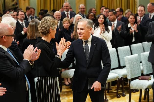 March 14, 2025, Ottawa, On, Canada: Prime minister-designate Mark Carney smiles at his wife Diana Fox Carney as he arrives for a swearing in ceremony at Rideau Hall in Ottawa on Friday, March 14, 2025. Ottawa Canada  - ZUMAc35_ 20250314_zaf_c35_160 Copyright: xSeanxKilpatrickx