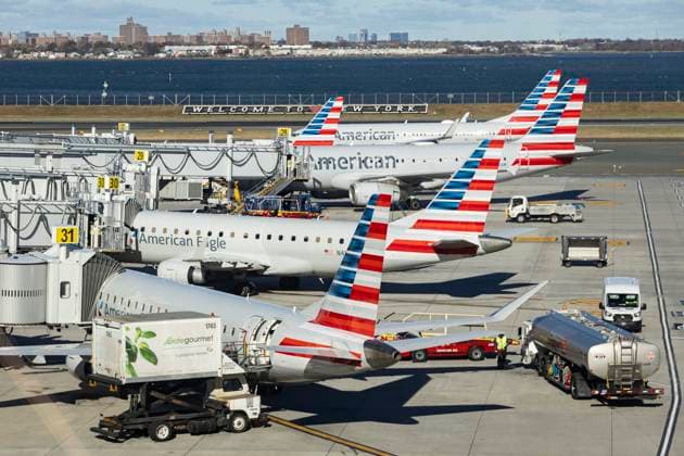 Fleet Of American Airlines In LaGuardia Airport Fleet of American Airlines aircraft spotted parked on the tarmac in front of LaGuardia LGA Airport passenger terminal some connected with air bridge. Fleet of American Airlines of Airbus A319, A320 and Boeing 737 airplane type seen among other American Eagle jets, a subsidiary airline of AA with regional carriers, some owned and other third party carriers with a fleet of Embraer ERJ and Bombardier CRJ planes. American Airlines AA is one of the largest airline carrier in the world with main hub, base and headquarters in Dallas Fort Worth International Airport DFW in Texas and a fleet of 982 planes. LaGuardia Airport, New York, United States of America on November 12, 2024 New York United Sta  Copyright: xNicolasxEconomoux originalFilename: economou-notitle241112_npHi5.jpg