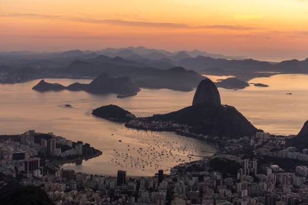 Beautiful sunrise view from Corcovado to city, ocean and Sugar Loaf Rio de Janeiro, State of Rio de Janeiro, Brazil R_GNUJ250312A-1676699-01