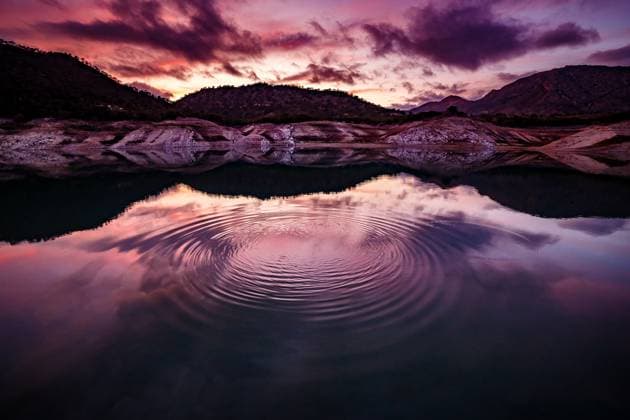 Creative Highlights World Hills reflected in the Villajoyosa reservoir during sunset Villajoyosa, Valencian Community, Spain R_FTRG25031257-1675820-01