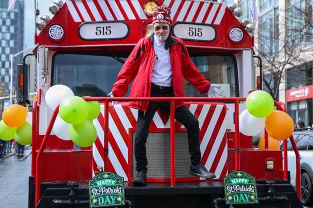 2025 Toronto St. Patrick s Day Parade A parade participant poses in front of a locomotive-like truck during the 2025 Toronto St. Patrick s Day Parade in Toronto, Ontario, Canada, on March 16, 2025. Toronto Ontario Canada  Copyright: xIndrawanxKumalax originalFilename: kumala-2025toro250316_np8Bk.jpg