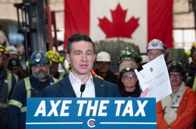 March 17, 2025, L orignal, On, Canada: Conservative Leader Pierre Poilievre holds up a copy of the Greenhouse Gas Pollution Pricing Act as he speaks at at the Ivaco rolling mill in L Orignal, Ont., Monday, March 17, 2025. L orignal Canada  - ZUMAc35_ 20250317_zaf_c35_079 Copyright: xAdrianxWyldx
