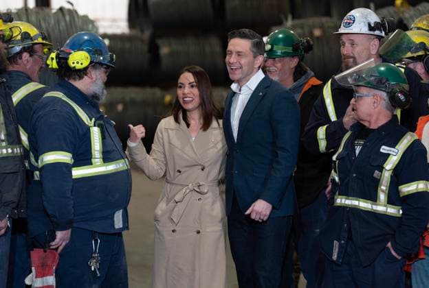 March 17, 2025, L orignal, On, Canada: Conservative Leader Pierre Poilievre and his wife Anaida Poilievre speak with workers as they arrive for a news conference at the Ivaco rolling mill in L Orignal, Ont., Monday, March 17, 2025. L orignal Canada  - ZUMAc35_ 20250317_zaf_c35_082 Copyright: xAdrianxWyldx