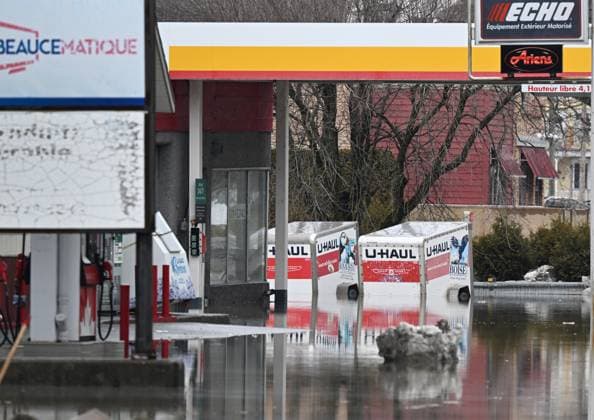 March 17, 2025, Beauceville, Pq, Canada: A gas station are flooded on highway 173 in Beauceville, Que., Monday, March 17, 2025. The Chaudiere river flooded the city after an ice blockage overnight. Beauceville Canada  - ZUMAc35_ 20250317_zaf_c35_086 Copyright: xJacquesxBoissinotx