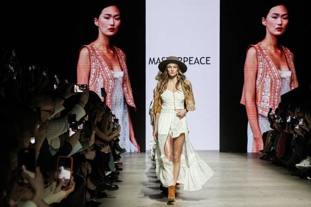 RUSSIA, MOSCOW - MARCH 18, 2025: A model showcases creations during a runway show for the collection by Masterpeace as part of the 4th Moscow Fashion Week at the Manege Central Exhibition Hall. Valery Sharifulin TASS  79203021