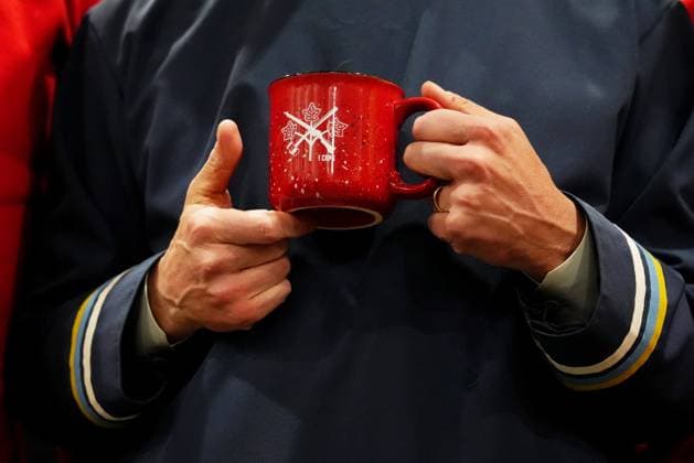 March 18, 2025, Iqaluit, Nunavut, Canada: Prime Minister Mark Carney holds a mug gifted to him by the Canadian Rangers after making an announcement at a Canadian Armed Forces forward-operating location in Iqaluit, Nunavut, on Tuesday, March 18, 2025. Iqaluit Canada  - ZUMAc35_ 20250318_zaf_c35_052 Copyright: xSeanxKilpatrickx