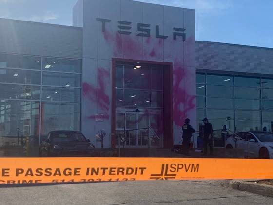 March 19, 2025, Montreal, Pq, CANADA: Activists from Last Generation Canada sprayed a Montreal Tesla dealership with pink paint as shown on Wednesday, March 19 in Montreal. Montreal CANADA  - ZUMAc35_ 20250319_zaf_c35_006 Copyright: xSto PhanexBlaisx