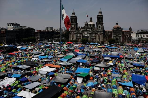 March 19, 2025, Mexico City, Cdmx, Mexico: Thousands of teachers from the National Coordinator of Education Workers (CNTE) are holding a 72-hour sit-in, setting up tents and banners in Constitution Square, in front of the National Palace in Mexico City, despite President Claudia Sheinbaum s decision to withdraw the initiative to reform the Law of the Institute of Security and Social Services for State Workers Mexico City Mexico - ZUMAp204 20250319_zip_p204_033 Copyright: xJosuexPerezx