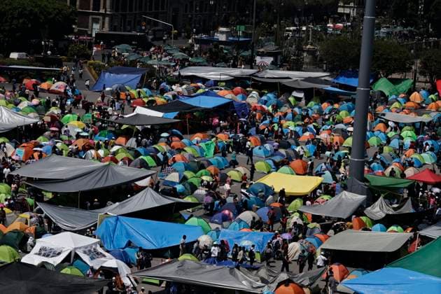 March 19, 2025, Mexico City, Cdmx, Mexico: Thousands of teachers from the National Coordinator of Education Workers (CNTE) are holding a 72-hour sit-in, setting up tents and banners in Constitution Square, in front of the National Palace in Mexico City, despite President Claudia Sheinbaum s decision to withdraw the initiative to reform the Law of the Institute of Security and Social Services for State Workers Mexico City Mexico - ZUMAp204 20250319_zip_p204_037 Copyright: xJosuexPerezx