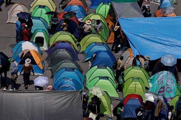 March 19, 2025, Mexico City, Cdmx, Mexico: Thousands of teachers from the National Coordinator of Education Workers (CNTE) are holding a 72-hour sit-in, setting up tents and banners in Constitution Square, in front of the National Palace in Mexico City, despite President Claudia Sheinbaum s decision to withdraw the initiative to reform the Law of the Institute of Security and Social Services for State Workers Mexico City Mexico - ZUMAp204 20250319_zip_p204_026 Copyright: xJosuexPerezx