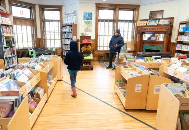 March 21, 2025, Derby Line, Vt, USA: A young girl walks over the Canada-USA international border line into Canada from inside the Haskell Free Library and Opera House in Derby Line, Vermont on Friday, March 21, 2025. The town of Stanstead, Que., says U.S. authorities have unilaterally decided to close the main Canadian access to the Victorian-style library that straddles the border between the two countries. Derby Line USA  - ZUMAc35_ 20250321_zaf_c35_039 Copyright: xChristinnexMuschix