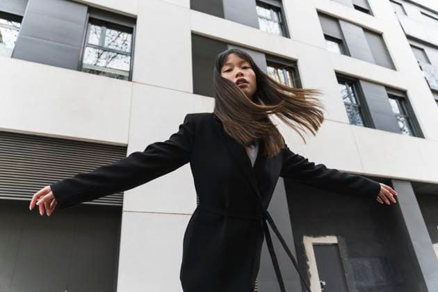 Creative Highlights Symbolfotos Successful businesswoman dancing in the street model released, Symbolfoto, PNAF06704