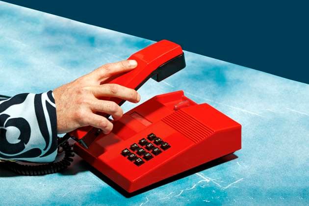 Creative Highlights Symbolfotos Caucasian male making a call with a retro red telephone model released, Symbolfoto, RDTF00375