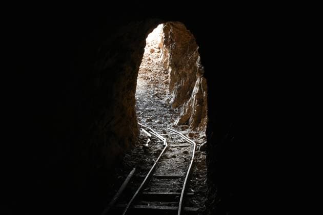 Abandoned Underground Mine Exit with Rail for Ore Carts in Arizona Abandoned Underground Mine Exit with Rail for Ore Carts in Arizona. High quality photo Copyright: xZoonar.com AngelaxFeltesx 22974698