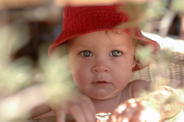 Creative Highlights Symbolfotos Close-up Portrait of a Curious Toddler Wearing a Red Hat Outdoors in Natural Light Close-up Portrait of a Curious Toddler Wearing a Red Hat Outdoors in Natural Light ,model released, Symbolfoto Copyright: xZoonar.com WojciechxKozielczykx 22246716 ,model released, Symbolfoto ,property released