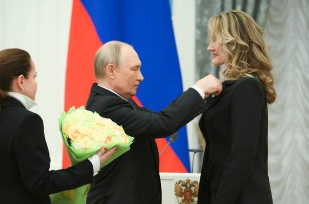 Russia Putin Culture Presidential Prize 8887511 25.03.2025 Russian President Vladimir Putin awards Ð¡hoirmaster of the Loktev Song and Dance Ensemble (Moscow) Anna Averianenko during a ceremony to award the winners of the 2024 Presidential Prize for young culture professionals and for writing and art for children and young people at the Kremlin in Moscow, Russia. Alexey Maishev Sputnik Moscow Russia  Copyright: xAlexeyxMaishevx