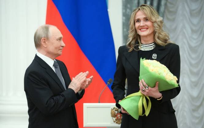 Russia Putin Culture Presidential Prize 8887513 25.03.2025 Russian President Vladimir Putin awards Ð¡hoirmaster of the Loktev Song and Dance Ensemble (Moscow) Anna Averianenko during a ceremony to award the winners of the 2024 Presidential Prize for young culture professionals and for writing and art for children and young people at the Kremlin in Moscow, Russia. Alexey Maishev Sputnik Moscow Russia  Copyright: xAlexeyxMaishevx
