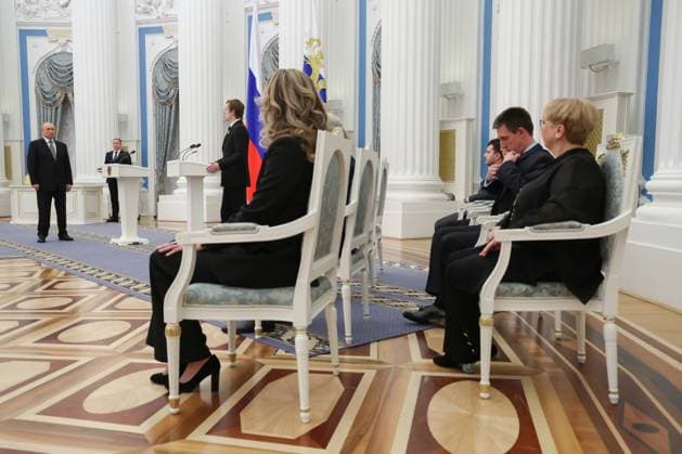 Russia Putin Culture Presidential Prize 8887552 25.03.2025 Russian President Vladimir Putin listens as Artistic Director of the Moscow State Academic Symphony Orchestra Ivan Nikiforchin speaks during a ceremony to award the winners of the 2024 Presidential Prize for young culture professionals and for writing and art for children and young people at the Kremlin in Moscow, Russia. Vyacheslav Prokofyev POOL Moscow Russia  Copyright: xVyacheslavxProkofyevx