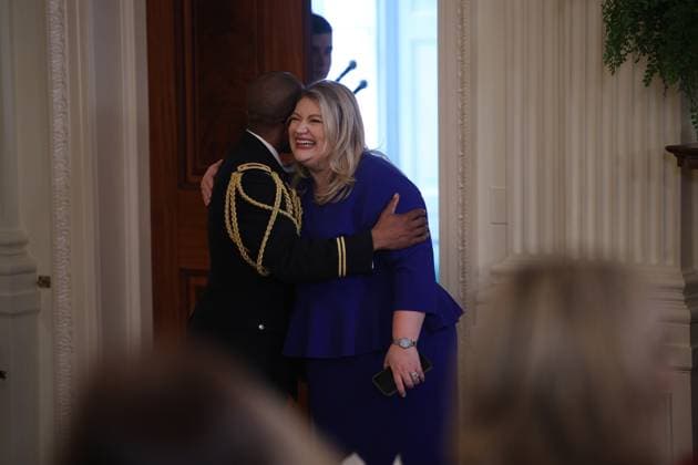 March 26, 2025, Washington, District Of Columbia, USA: United States Representative Kat Cammack (Republican of Florida), right, is embraced as she arrives for a Women™s History Month Event in the East Room of the White House in Washington, DC, USA on March 26, 2025 Washington USA - ZUMAs152 20250326_faa_s152_066 Copyright: xFrancisxChungx-xPoolxviaxCNPx