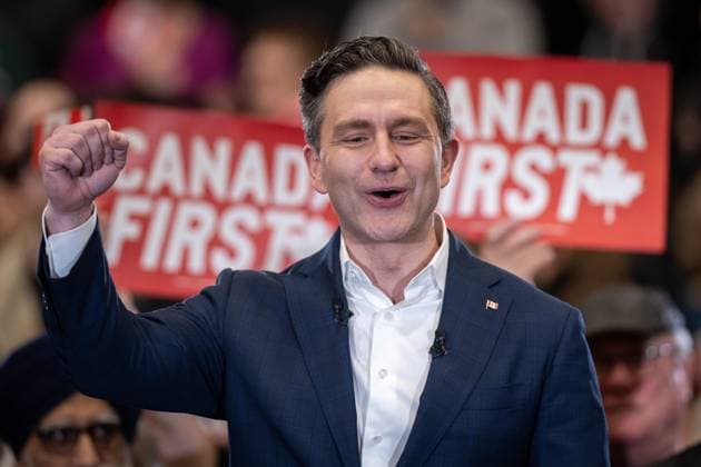 March 27, 2025, Surrey, Bc, CANADA: Conservative Leader Pierre Poilievre cheers to end his campaign rally in Surrey B.C., on Thursday, March 27, 2025. Surrey CANADA  - ZUMAc35_ 20250327_zaf_c35_098 Copyright: xEthanxCairnsx