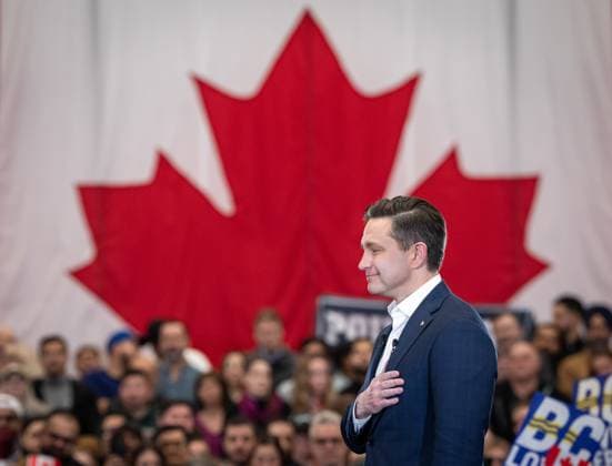 March 27, 2025, Surrey, Bc, CANADA: Conservative Leader Pierre Poilievre pauses as he speaks during a campaign rally in Surrey B.C., on Thursday, March 27, 2025. Surrey CANADA  - ZUMAc35_ 20250327_zaf_c35_101 Copyright: xEthanxCairnsx