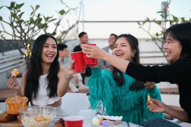 Cheerful male and female friends enjoying happy hour at terrace party and toasting drinks, model released, , 56930832.jpg, party, rooftop, friendship, celebrating, person, sunset, alcohol, terrace, summer, outdoors, lifestyles, group, friends, celebration, smiling, drink, happiness, togetherness, enjoyment, joy, carefree, male, young adult, weekend, laughing, bar, balcony, cheer, talking, night, urban, relaxation, pub, roof, sky, enjoying, dining, beverage, restaurant, entertainment, event, festival, adolescence, festive, chatting, colleague, having fun, joyful, union, friday RECORD DATE NOT STATED