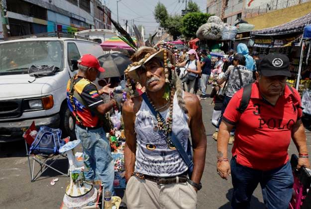 Daily Life In Mexico City A person stands outside the Santa Muerte temple in Tepito, Mexico City, Mexico, on April 1, 2025, where several people attend to give thanks for the favors granted by La Nina Blanca. Mexico City Mexico City Mexico  Copyright: xGerardoxVieyrax originalFilename: vieyra-notitle250401_npUAq.jpg