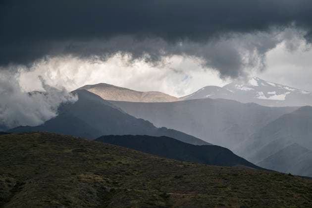 Creative Highlights World Beautiful view to Andes mountains and dark rain clouds in Las Carreras Mendoza, Mendoza Province, Argentina R_GNUJ250401A-1697305-01