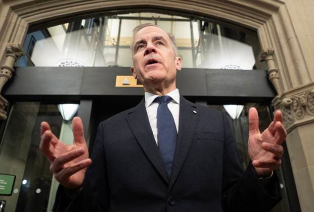 April 2, 2025, Ottawa, On, Canada: Prime Minister Mark Carney speaks with media before chairing a meeting of the Cabinet Committee on Canada-U.S. Relations and National Security on Parliament Hill, Wednesday, April 2, 2025 in Ottawa. Ottawa Canada  - ZUMAc35_ 20250402_zaf_c35_098 Copyright: xAdrianxWyldx
