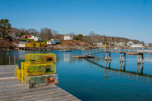 Lobster traps on a dock in the fishing village of New Harbor in the State of Maine, USA. Lobster traps on a dock in the fishing village of New Harbor in the State of Maine, USA.,  Copyright: xWolfgangxKaehlerx xAvalonx 0563095291