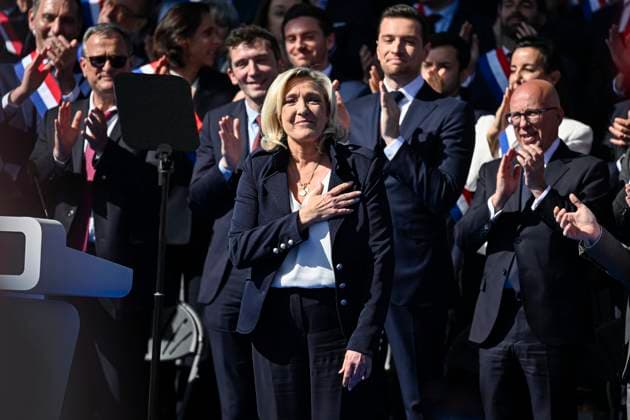 Bilder des Jahres 2025, News 04 April Rally In Support Of Marine Le Pen - Paris Marine Le Pen during a rally of Rassemblement National (RN) after her conviction for misappropriating funds in the European Parliament on April 6, 2025, in Paris, France. Photo by Victor Joly ABACAPRESS.COM Paris France  Copyright: xJolyxVictor ABACAx