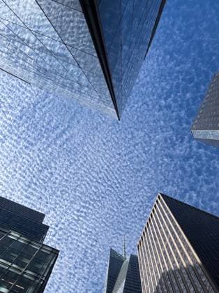 Creative Highlights World Skyscrapers in Midtown Manhattan with textured sky above United States, New York, New York R_NHDH250405-1699870-01