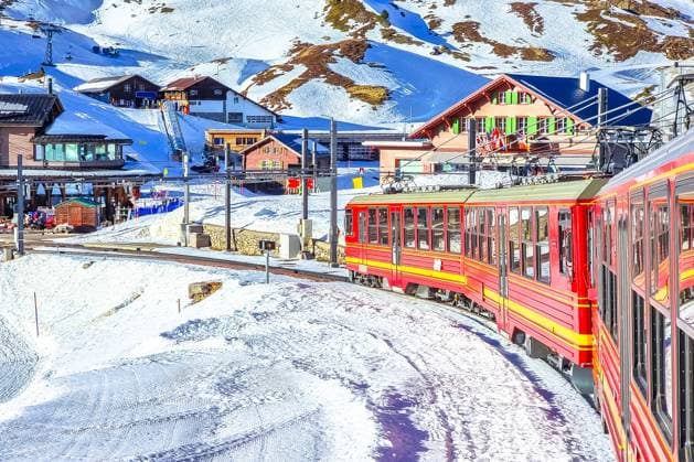 Kleine Scheidegg railway to Jungfraujoch peak view, Berner Oberland region of Switzerland , 58017084.jpg, kleine scheidegg, rail, railway, bahn, jungfrau, jungfraujoch, peak, wengernalpbahn, lauterbrunnen, grindelwald, eiger, ski, area, region, switzerland, alps, swiss, mountain, snow, skiing, winter, leisure, holiday, vacation, landscape, high, nature, top, europe, trip, transport, scenic, landmark, tourism, architecture, travel, european, schweiz, tourist, destination, alpine, panorama, panoramic, view, idyllic, village, bern, berner oberland RECORD DATE NOT STATED