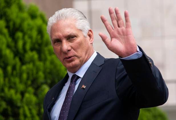 (250410) -- TEGUCIGALPA, April 10, 2025 -- Cuban President Miguel Diaz-Canel waves at his arrival to the 9th Summit of Heads of State and Government of the Community of Latin American and Caribbean States (CELAC) in Tegucigalpa, capital of Honduras, April 9, 2025. The summit was attended by over a dozen heads of state and delegations from the bloc s 33 member countries. Honduras formally handed over CELAC s rotating presidency to Colombia. (Photo by Xinhua) HONDURAS-TEGUCIGALPA-CELAC-SUMMIT DavidxdexlaxPaz 