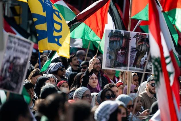 April 12, 2025, Ottawa, On, Canada: A Pro-Palestinian protestor wave a flag seen during a demonstration protesters are calling a National March for Palestine in Ottawa, on Saturday, April 12, 2025. Ottawa Canada  - ZUMAc35_ 20250412_zaf_c35_058 Copyright: xSpencerxColbyx