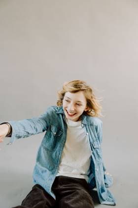 Creative Highlights Symbolfotos Teen boy playfully gestures forward with confident expression Boise, Idaho, United States CR_PHZD2504124B-1699952-01 ,model released, Symbolfoto