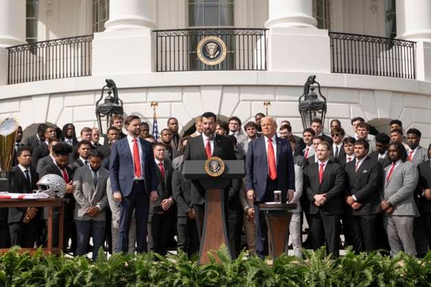 Ryan Day, coach for the 2025 College Football National Champions - The Ohio State University speaks as President Trump and Voce President JD Vance look on, on the South Lawn of the White House in Washington, DC on Monday, April 14, 2025.  WAS20250414570 KenxCedeno