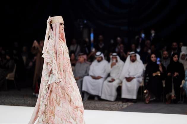 Modest Fashion Week second runaway in Abu Dhabi, United Arab Emirtaes - 14 Apr 2025 A model seen on stage for Miha. Designers Miha (Turkey), Salam Design (Palestine), Turana Atash (London - UK), Arta Kallaba (USA) and Khalifa Fund x Emirati Designers (UAE) attend the first runaway of Abu Dhabi Modest Fashion Week organized by Think Fashion at St. Regis Saadiyat Island Resort. Abu Dhabi United Arab Emirates Copyright: xValeriaxFerrarox xSOPAxImagesx FerraroValeria_14042025_Second runaway of Modest Fashion Week in Abu Dhabi (14 April)_112