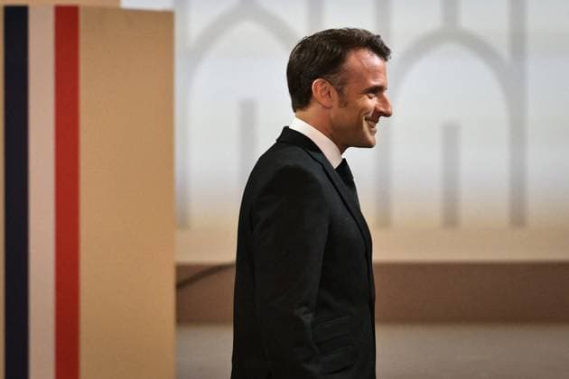 Emmanuel Macron awards those involved in Notre Dame de Paris Cathedral restorations - FA French President Emmanuel Macron walks before awarding those involved in the restorations of Notre-Dame de Paris Cathedral at the Elysee Palace in Paris on April 15, 2025. Photo by Firas Abdullah ABACAPRESS.COM Paris Ile-de-France France  Copyright: xAbdullahxFiras ABACAx