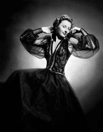 Archivbilder der Woche KW16 Barbara Stanwyck - filmstill Barbara Stanwyck (1940) wearing a black evening dress with a sequinned bustier and tulle sleeves - - - EDITORIAL USE ONLY Copyright: xCAP NFSx