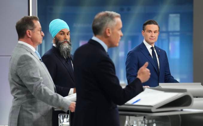 April 16, 2025, Montreal, Pq, Canada: Conservative Leader Pierre Poilievre, New Democratic Party Leader Jagmeet Singh and Bloc Quebecois Leader Yves-Francois Blanchet listen as Liberal Leader Mark Carney speaks during the French-language federal leaders debate, in Montreal, Wednesday, April 16, 2025. Montreal Canada  - ZUMAc35_ 20250416_zaf_c35_135 Copyright: xSeanxKilpatrickx