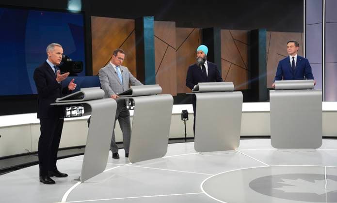 April 16, 2025, Montreal, Pq, Canada: Conservative Leader Pierre Poilievre, New Democratic Party Leader Jagmeet Singh and Bloc Quebecois Leader Yves-Francois Blanchet listen as Liberal Leader Mark Carney speaks during the French-language federal leaders debate, in Montreal, Wednesday, April 16, 2025. Montreal Canada  - ZUMAc35_ 20250416_zaf_c35_137 Copyright: xSeanxKilpatrickx
