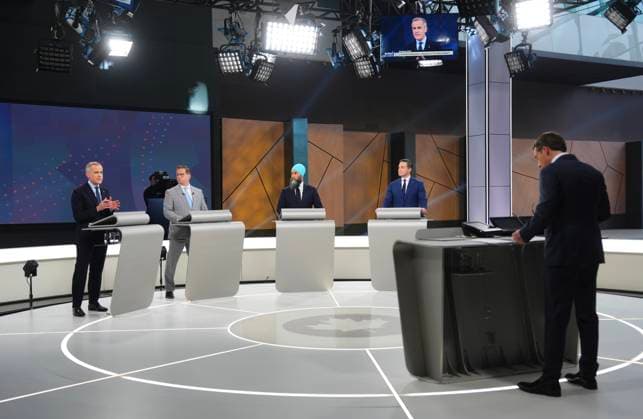 April 16, 2025, Montreal, Pq, Canada: Moderator, Radio-CanadaöÄÃ s Patrice Roy, Bloc Quebecois Leader Yves-Francois Blanchet, New Democratic Party Leader Jagmeet Singh and Conservative Leader Pierre Poilievre listen as Liberal Leader Mark Carney speaks during the French-language federal leaders debate, in Montreal, Wednesday, April 16, 2025. Montreal Canada  - ZUMAc35_ 20250416_zaf_c35_142 Copyright: xSeanxKilpatrickx