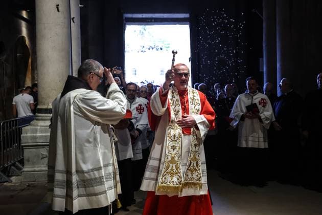 Washing of the Feet ceremony Pierbattista Pizzaballa (C), the Latin Patriarch of Jerusalem, sprinkles holy water during the Washing of the Feet ceremony at the Church of the Holy Sepulchre in Jerusalem on April 17, 2025. photo by saeed qaq Copyright: xsaeedqaqx 073A8945