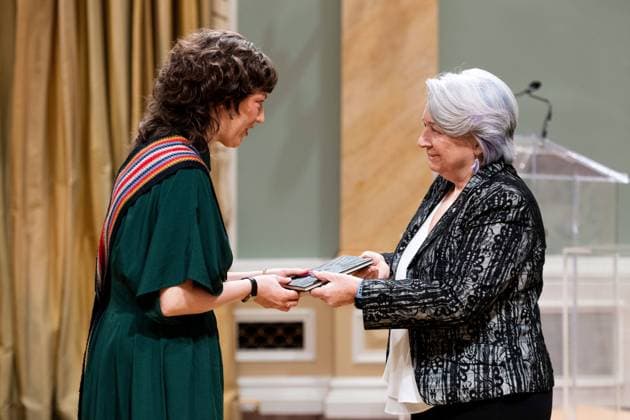 April 17, 2025, Ottawa, On, Canada: Gov. Gen. Mary Simon, right, presents Caleigh Crow with the Governor GeneralöÄÃ s Literary Award in Drama for There Is Violence and There Is Righteous Violence and There Is Death, or the Born-Again Crow during a ceremony at Rideau Hall in Ottawa, on Thursday, April 17, 2025. Ottawa Canada  - ZUMAc35_ 20250417_zaf_c35_030 Copyright: xSpencerxColbyx