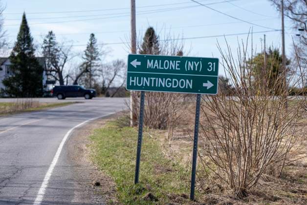 April 17, 2025, Godmanchester, Pq, CANADA: A sign shows the nearest towns near Godmanchester, Que., on Thursday, April 17, 2025. Surete du Quebec and RCMP officers are searching for a woman and her two children who are missing after crossing the border into Canada illegally overnight. Godmanchester CANADA  - ZUMAc35_ 20250417_zaf_c35_070 Copyright: xChristinnexMuschix
