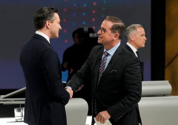 April 17, 2025, Montreal, Quebec, Canada: Conservative Leader Pierre Poilievre, left, talks with Bloc Quebecois Leader Yves-Francois Blanchet following the English-language federal leaders debate in Montreal, Thursday, April 17, 2025. Montreal Canada  - ZUMAc35_ 20250417_zaf_c35_165 Copyright: xAdrianxWyldx