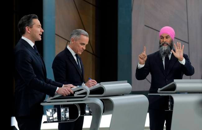 April 17, 2025, Montreal, Quebec, Canada: Conservative Leader Pierre Poilievre, left to right, Liberal Leader Mark Carney and New Democratic Party Leader Jagmeet Singh participate in the English-language federal leaders debate in Montreal, Thursday, April 17, 2025. Montreal Canada  - ZUMAc35_ 20250417_zaf_c35_192 Copyright: xAdrianxWyldx