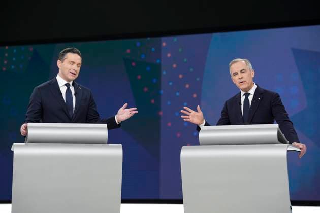 April 17, 2025, Montreal, Quebec, Canada: Conservative Leader Pierre Poilievre, left, and Liberal Leader Mark Carney participate in the English-language federal leaders debate in Montreal on Thursday, April 17, 2025. Montreal Canada  - ZUMAc35_ 20250417_zaf_c35_204 Copyright: xChristopherxKatsarovx